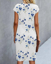 Blå blommig klänning med korta ärmar